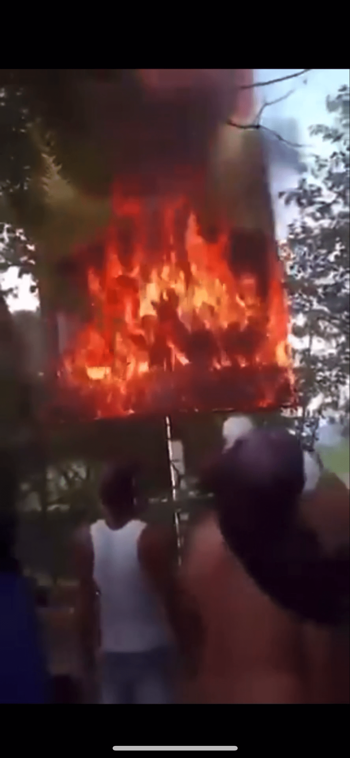 Burning Maduro Sign